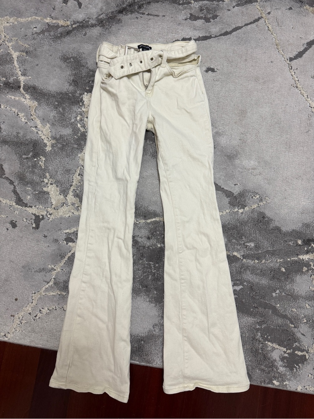 Cream High-Rise Flared Jeans with Belt